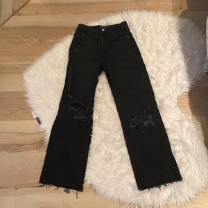 Jeans with rips at knees